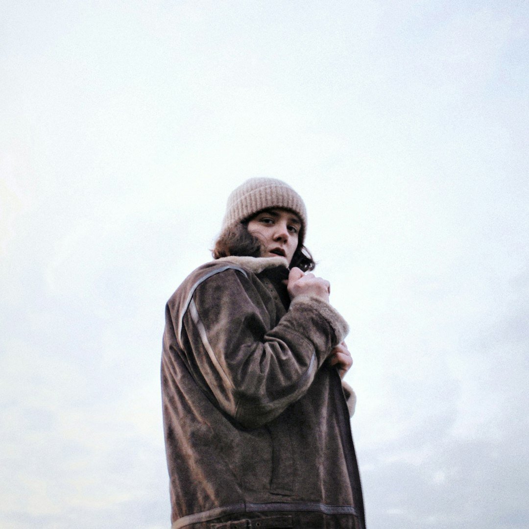 Studio portrait of a Croatian male documentary photographer in his 40s with a beard